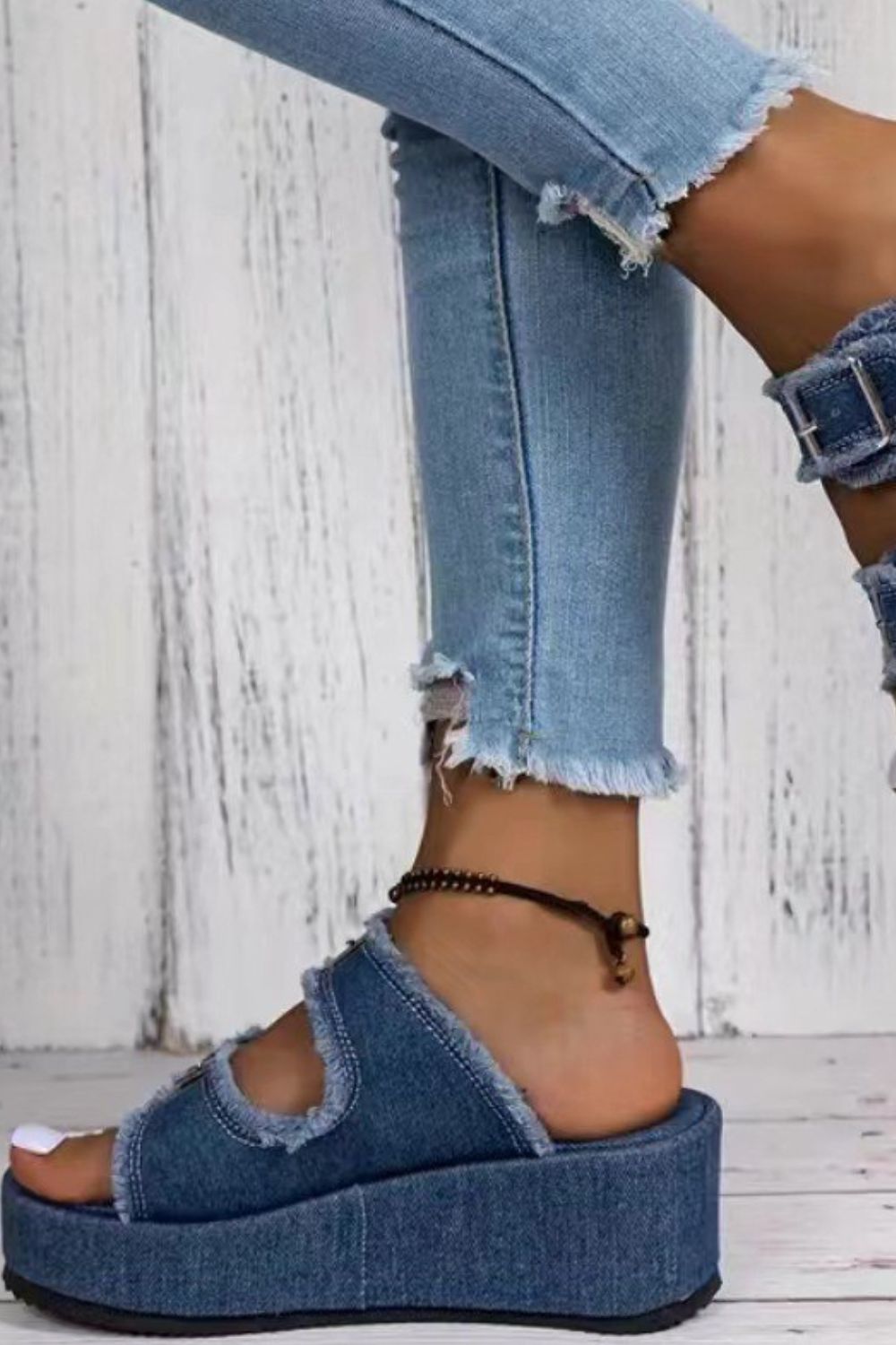 Raw Hem Wedge Buckle Sandals.
