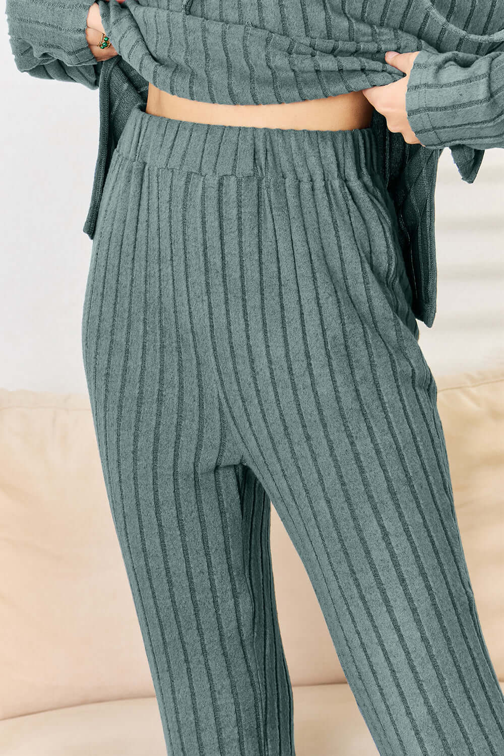 Close-up of ribbed drawstring pants from Basic Bae two-piece set in green, showcasing fabric texture and style.