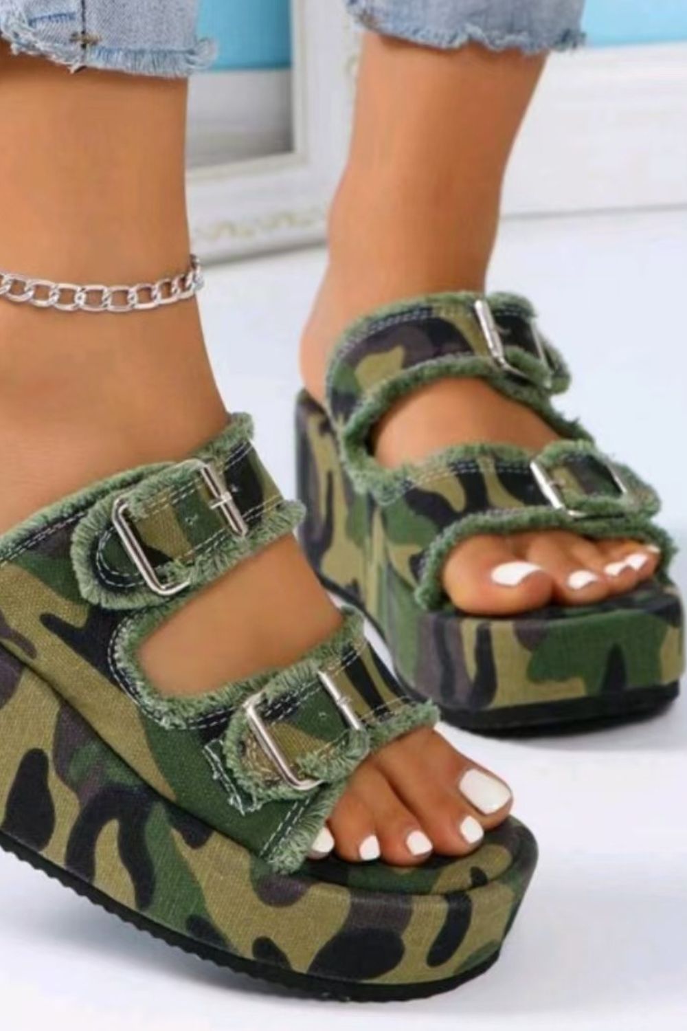 Raw Hem Wedge Buckle Sandals.